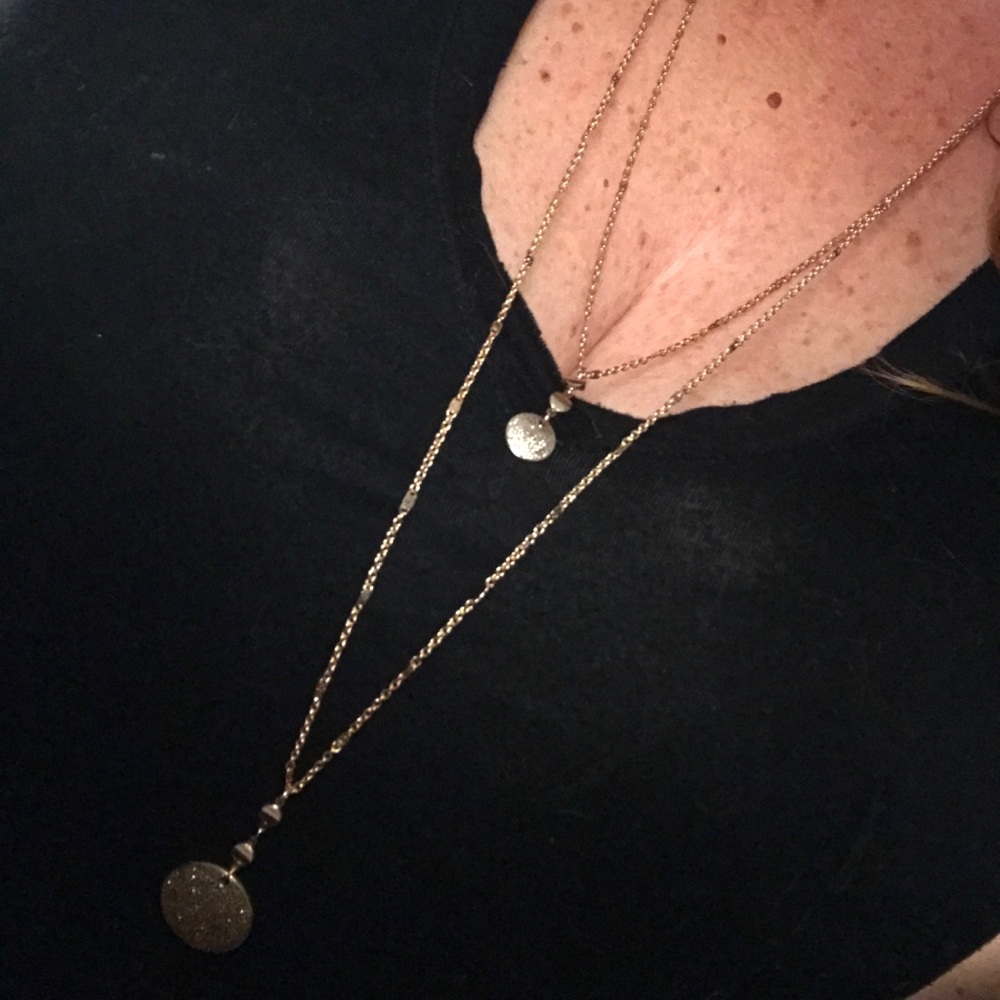 Long, gold necklace